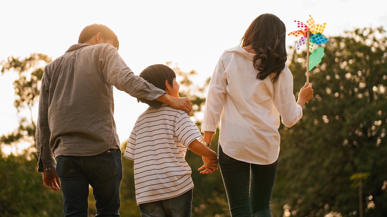 Silhouette Of Back View Of Asian Happy Family Spend Time Togethe